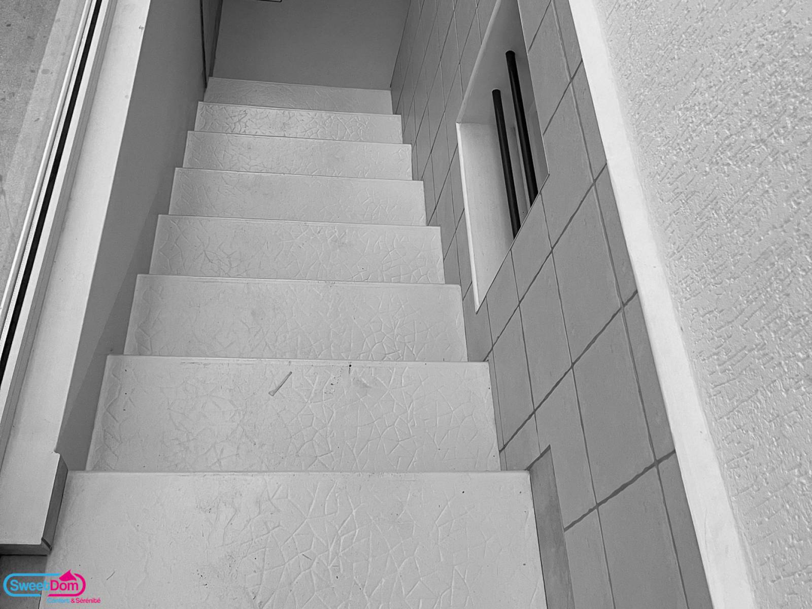 Poser une rambarde pour sécuriser l’accès à l’escalier à Versailles (78000)
