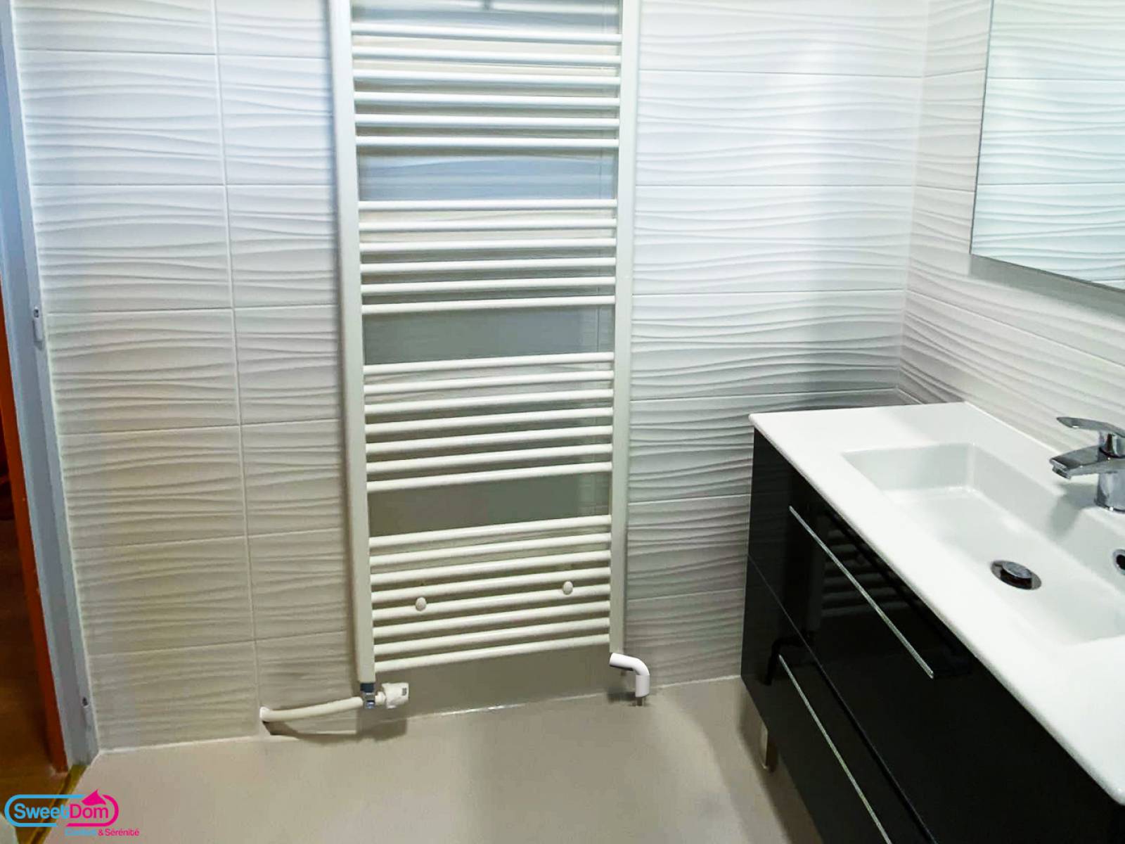 Installer un sèche serviette à Versailles (78000)