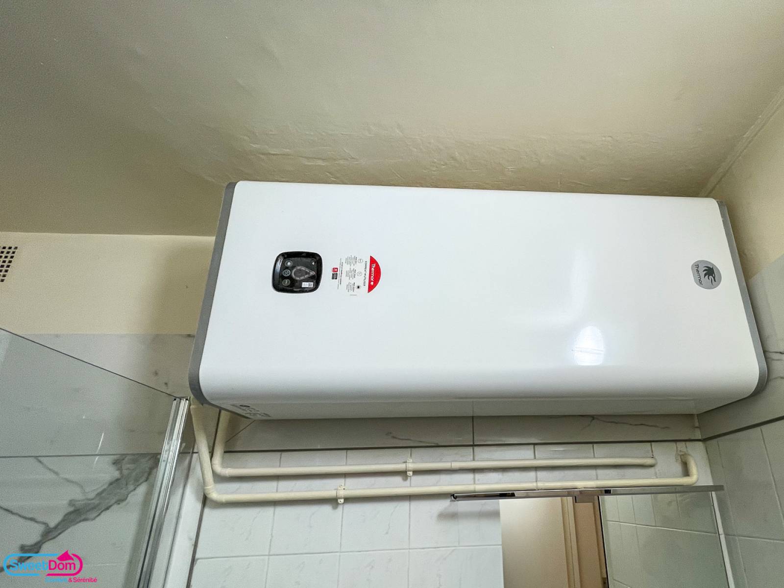 Remettre aux normes la salle de bains et changer le chauffe eau à Boulogne-Billancourt (92100)