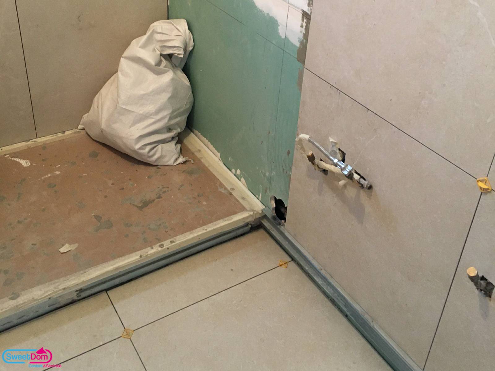 Mettre en place un grand receveur de douche à Levallois-Perret (92300)