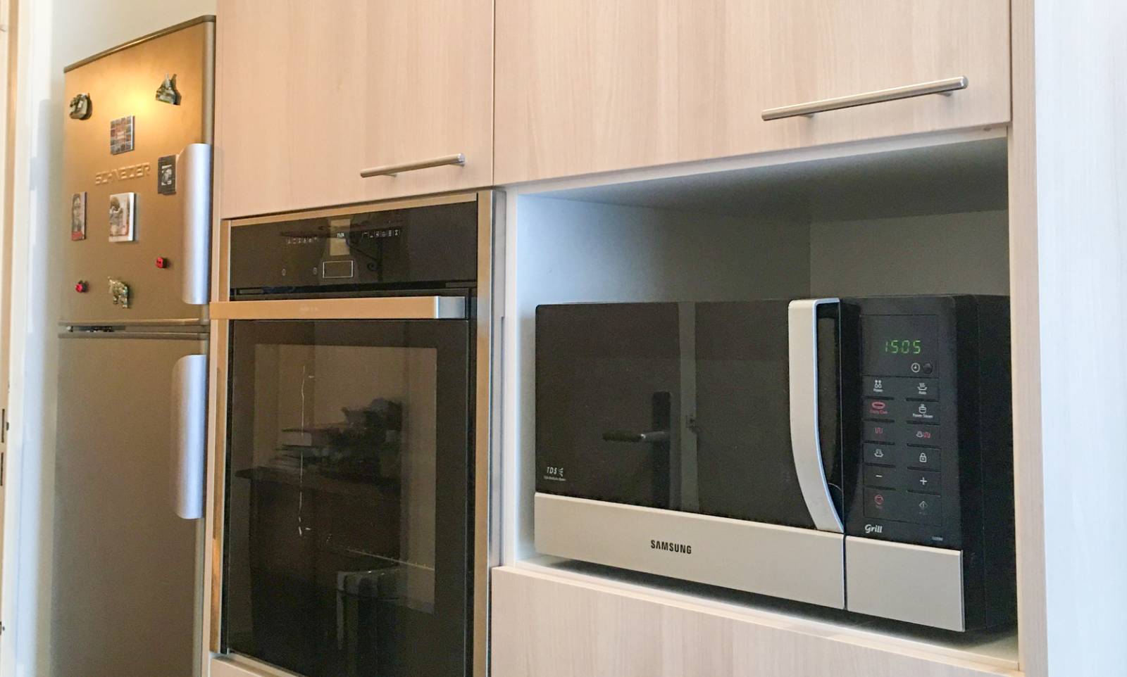 Installer des électroménagers dans une cuisine sur-mesure pour PMR à Paris 