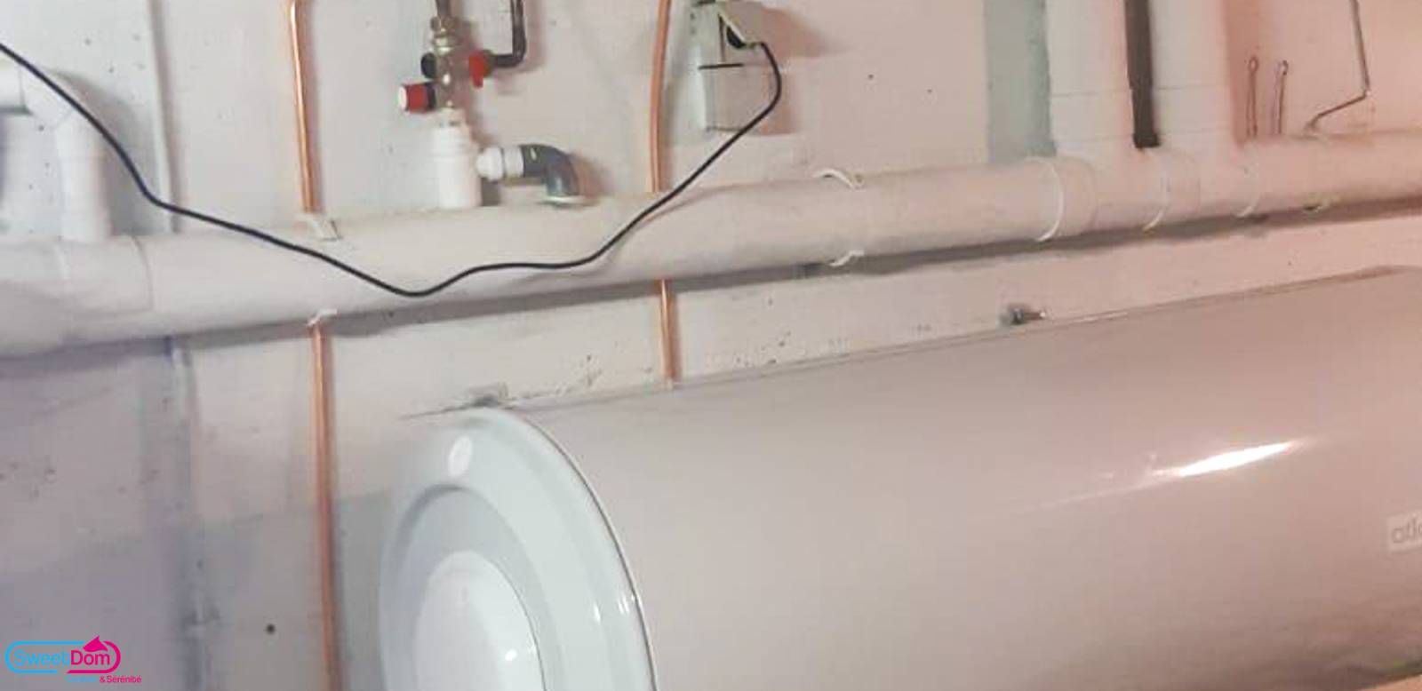 Déplacer le ballon d'eau chaude pour installer une douche à l'italienne à Versailles (78000)