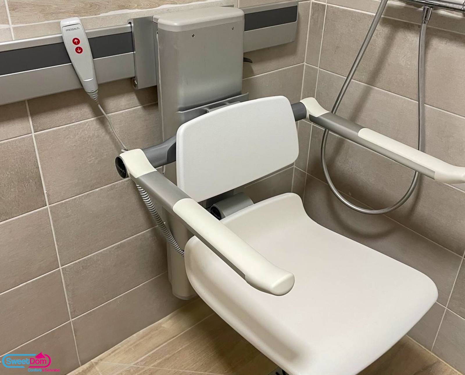 Siège de douche Pressalit relevable électriquement 