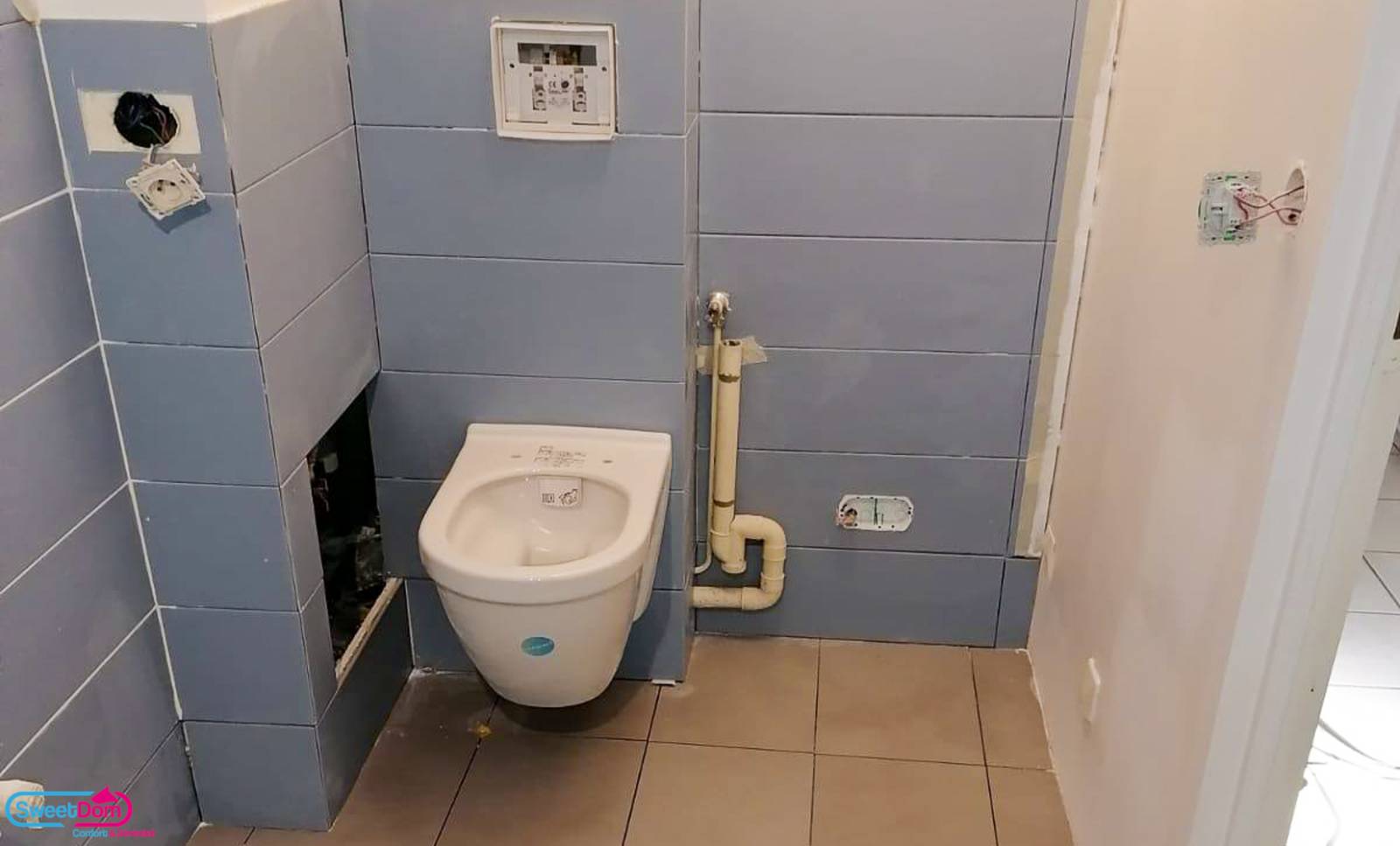 Mettre en place un WC suspendu dans sa salle d'eau avec du carrelage à Boulogne-Billancourt (92)