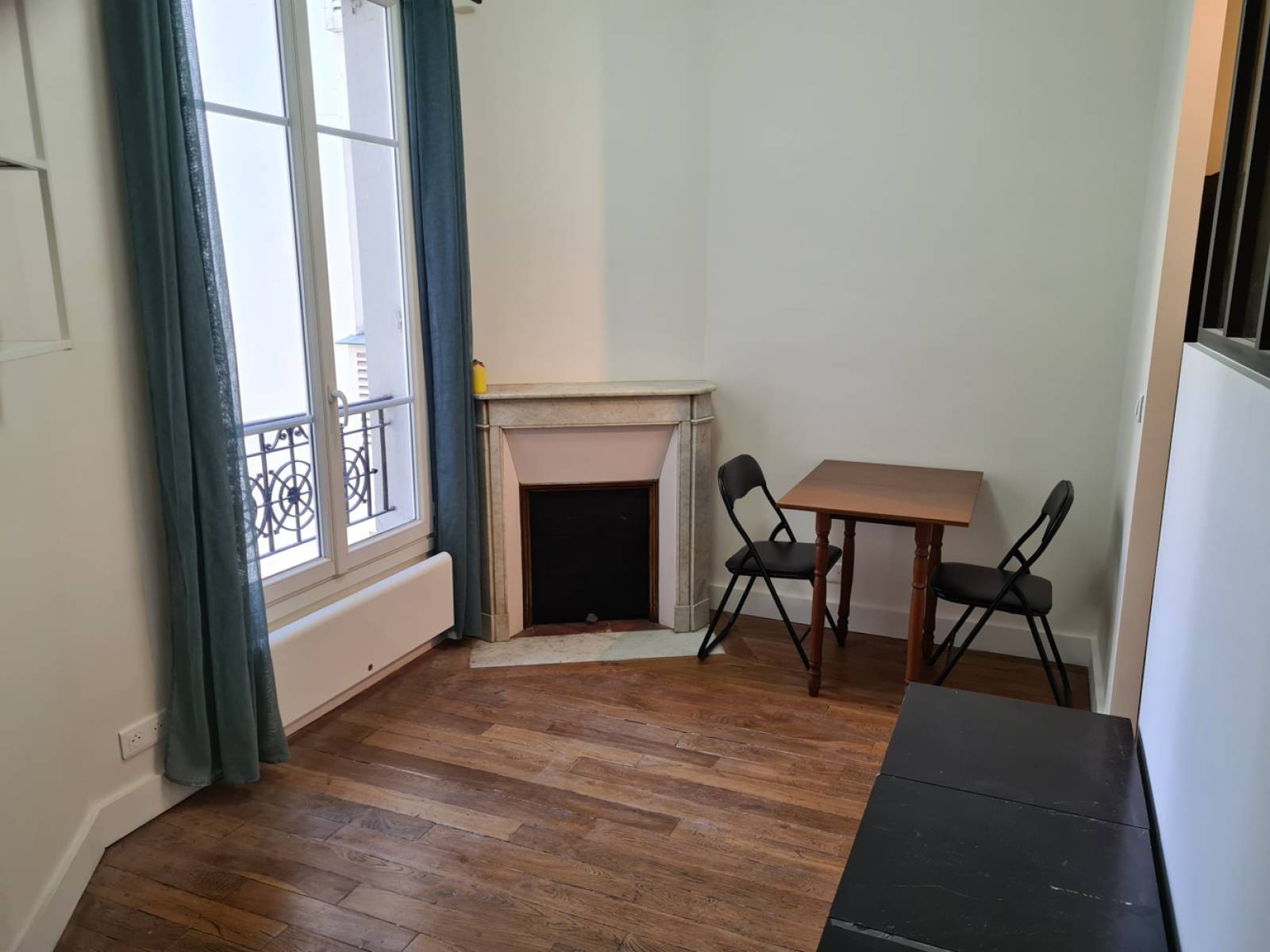 Salle à manger/Salon de l'appartement (75015)