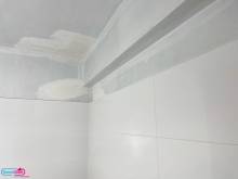 Reprise des murs pour la peinture dans la salle de bains à Arcueil (94)