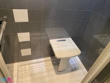 Installation d'un siège dans une douche existante