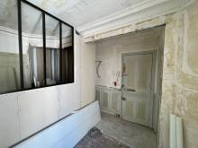 Ouverture d'un mur porteur pour agrandir l'entrée de l'appartement (75015)